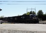 NS 3614 leads train 60U across Cabarrus Street 